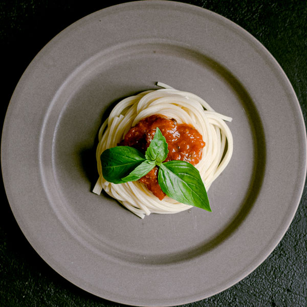 A plate of spaghetti and mince sold at Bella vita