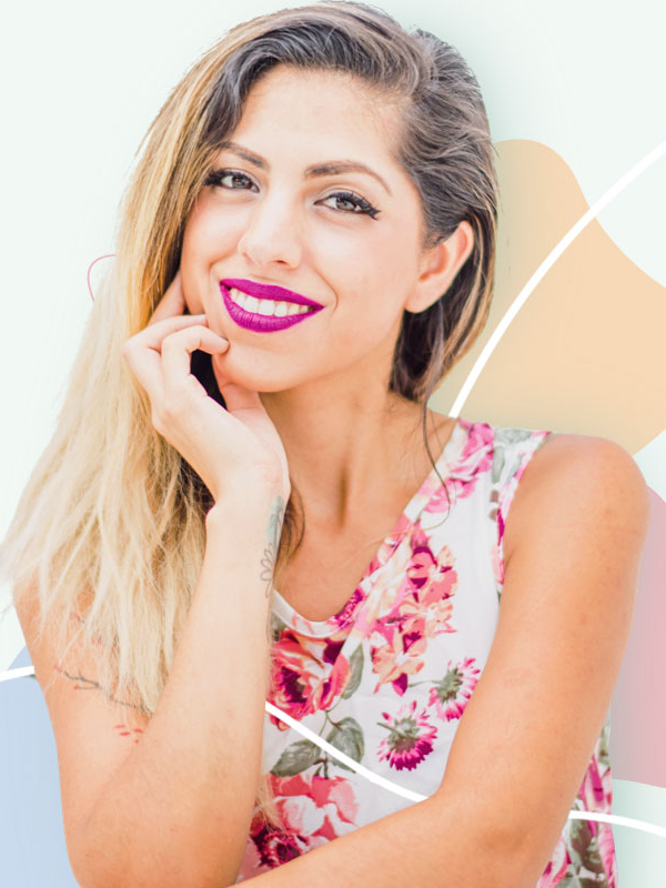 Attractive healthy smiling woman holding her chin with her hand